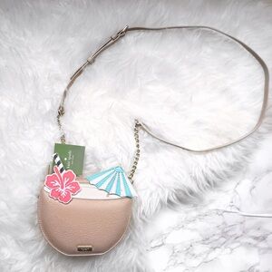 kate spade light pink and cream crossbody bag with tropical applique